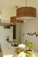 Drum light - pendant lamp above a kitchen table made of walnut wood